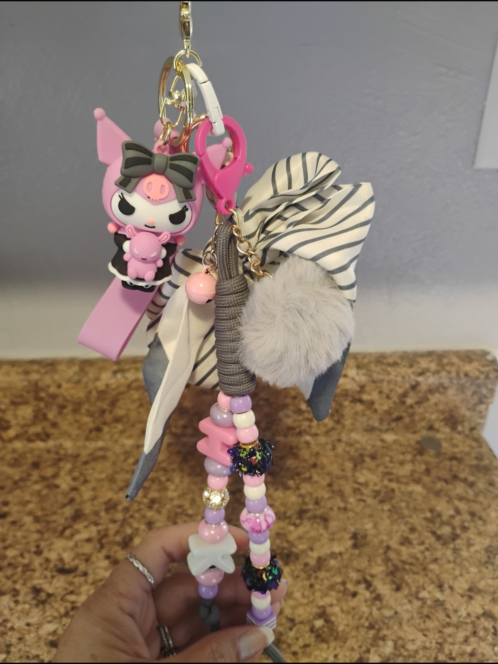 pink and gray kuromi bag charm